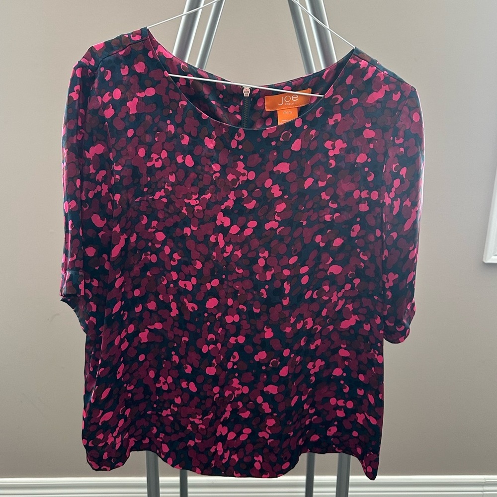Joe fresh multi coloured blouse with zipper detail on back.